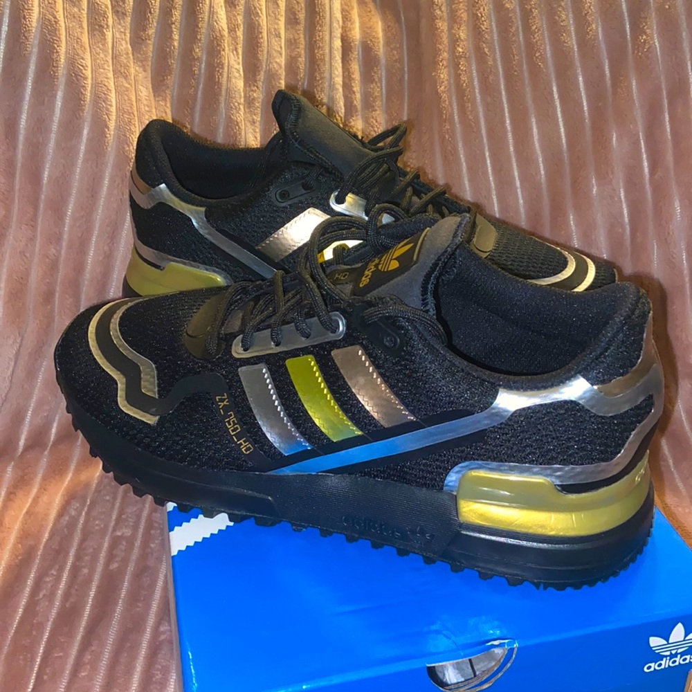Brand new Adidas sneakers size 5Y. Boys or Girls